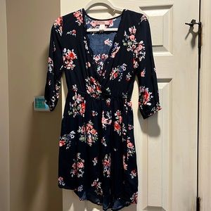 Flirty navy colored faux wrap dress